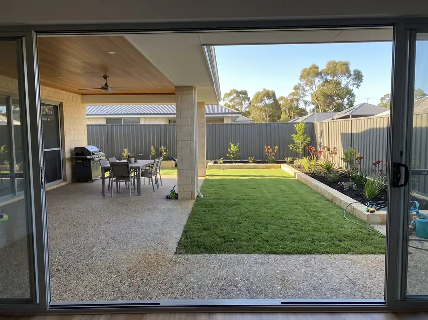 Exposed aggregate alfresco with new lawn and garden beds in Mandurah